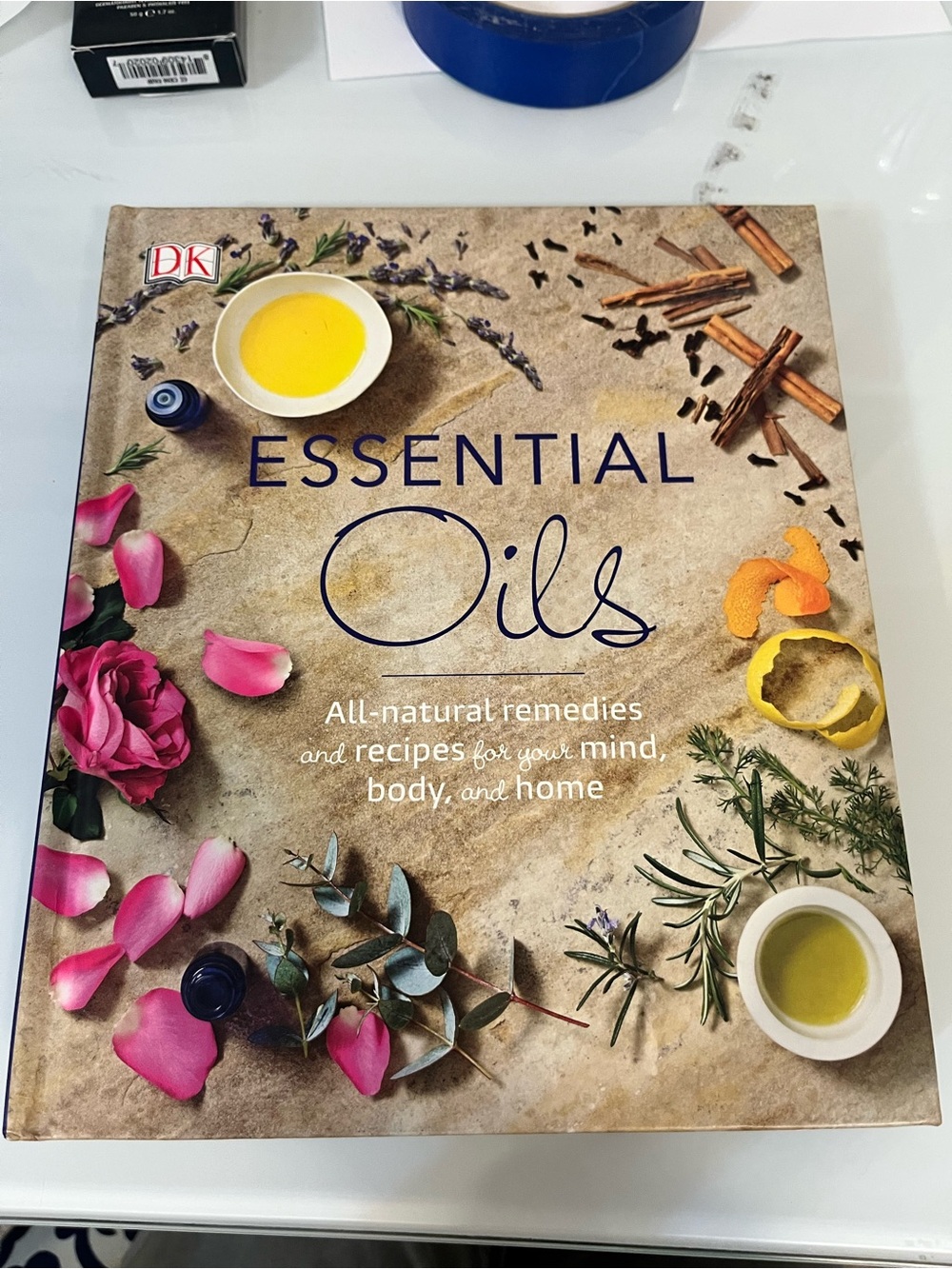 Essential Oils: 80+ All-Natural Remedies for Mind, Body, and Home hardback book